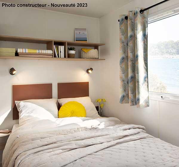 Kamer van de stacaravan Premium met 3 slaapkamers, gehuurd op de camping Les Ballastières in de Vogezen du Sud