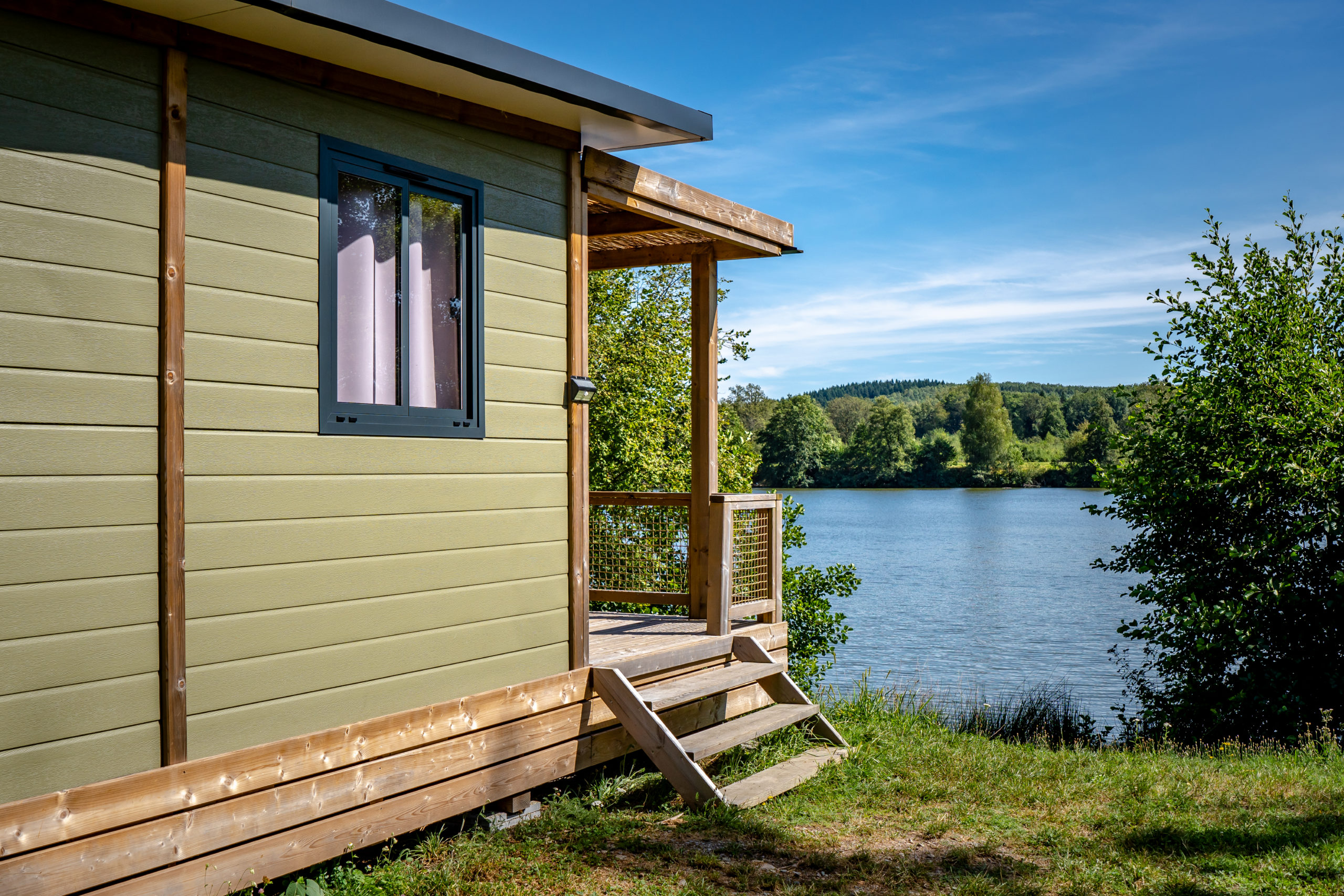 Cabin with lake view in serene landscape